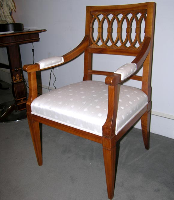 Very important and unique set of ten Biedermeier chairs.<br />
Consisting of two armchairs and eight side chairs.<br />
Hand carved cherrywood.<br />
Custom made by the Court Cabinet Makers <br />
of Castle Karlsruhe, Grand Duchy of Baden,<br