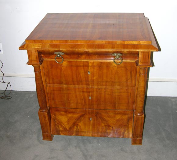 A fine small Biedermeier four drawer chest.