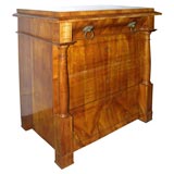 A fine small Biedermeier four drawer chest.