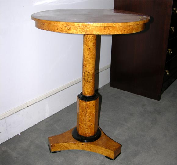 A small Neo-Classical pedestal center table.