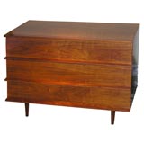 Architectural walnut chest of drawers