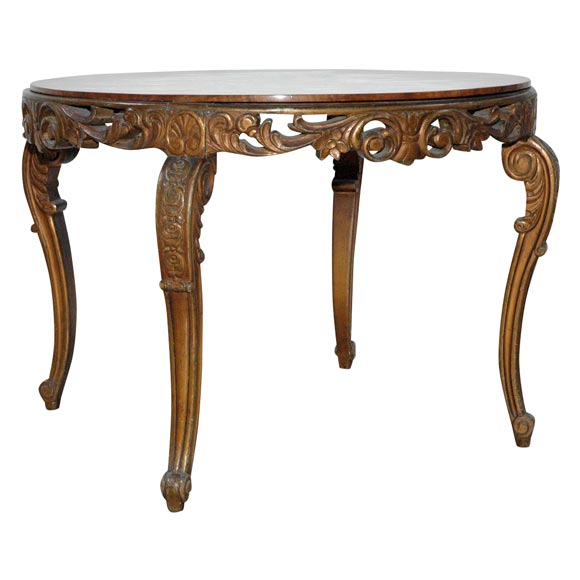 Italian, 1920s carved wood coffee table with round removable top.