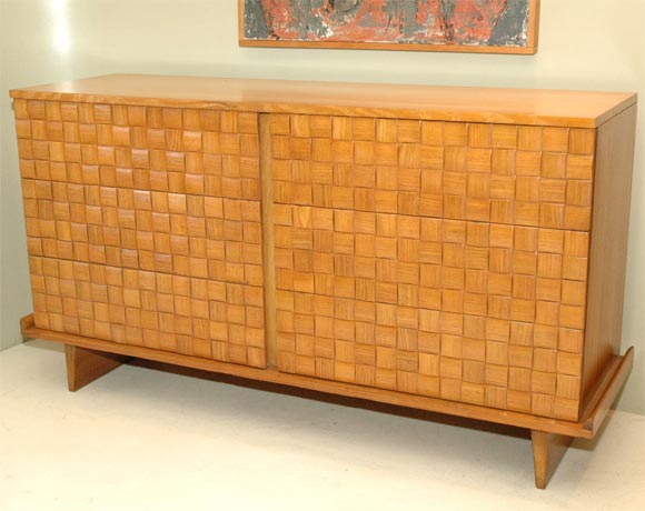 Six-drawer blond oak dresser with unique decorative patchwork fronts.  Designed by Paul Laszlo for Brown-Saltman.