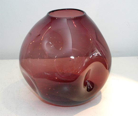BURGANDY WINE COLORED PINCHED VASE .
