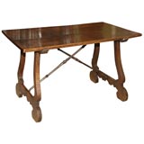 Walnut Treslle Table with Iron Stretcher