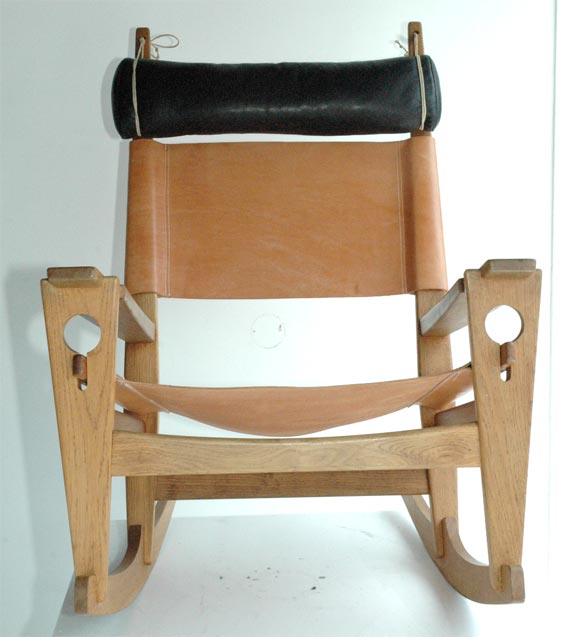 Beautifully made by Getama, this oak and cowhide rocker is very comfortable and commands a marvellous presence in a room. In style and color it will live well with most any other furniture.