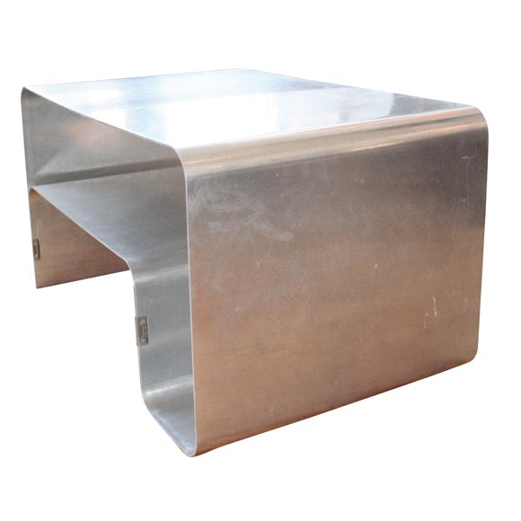 Folded steel side table by Joelle Ferlande