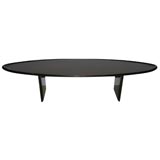 A Robsjohn Gibbings Surfboard Table.