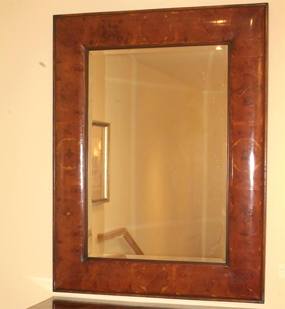 Rare 17th Century Period William and Mary Inlaid Pollard Yew Mirror With Thin Ebonized Banding and a Cushion Molded Oyster Burl Veneered Frame. Circa 1680.