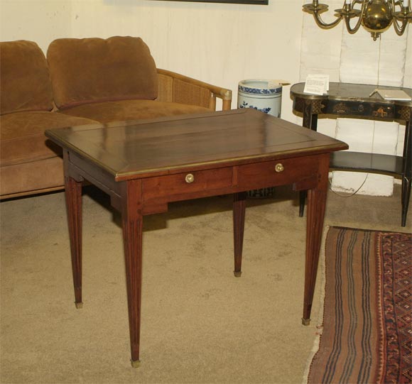 Directoire brass-mounted fruitwood bureau plat