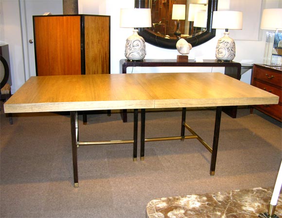 Dining table No. 819R with 2 leaves, top in bleached Brazilian rosewood and base in mahogany with solid brass stretchers, designed by Harvey Probber, American 1950's<br />
This table has 2 leaves and is 112 inches fully extended