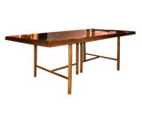 Dining table with leaves designed by Harvey Probber
