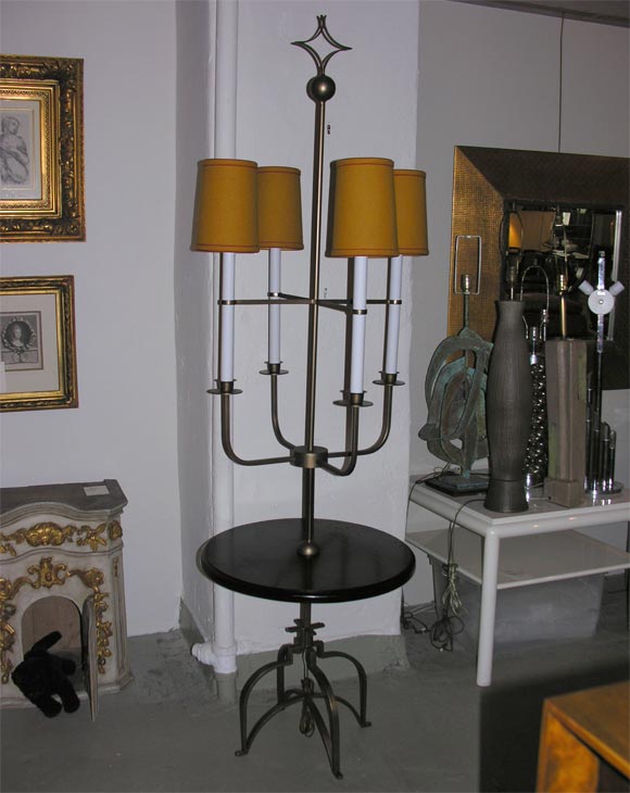 Four arm candelabra lamp with ebonized oak table, bronze patina and original felt shades.