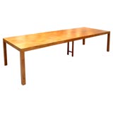 Burled wood parsons style dinig table by Directional