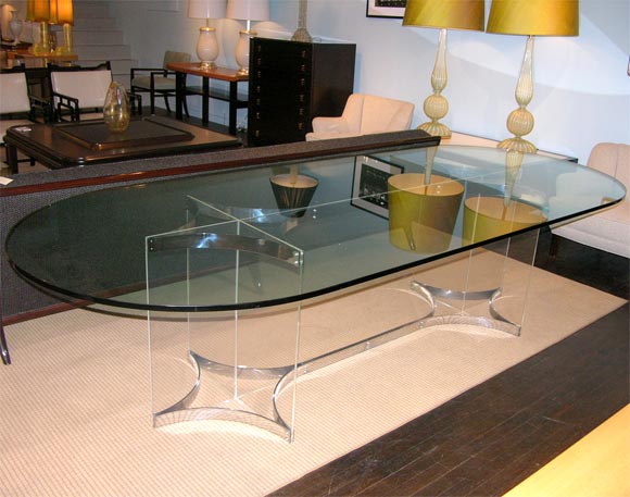 Dining Table w/ Large Oval Glass Top & Sculptural Base of Lucite & Chromed Steel.  Just under 10' long.