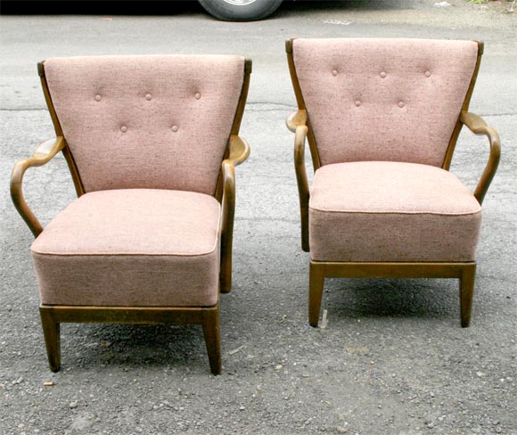 Comfortable pair of upholstered armchairs, with buttoned backs,  mahogany frames.<br />
danish cabinetmaker 20th century