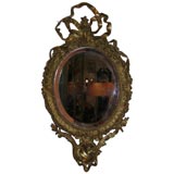 An Original Oval Gilt Louis XVI Wall Mirror
