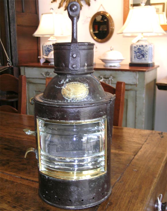 A Great Ship Lantern that utilizes Morse Code.The Brass Plaque on the front of the Lantern reads:<br />
Buyers Lamp Manufacture & Ship Store Dealer<br />
Cooper Smith Painter(name prior to Cooper is illegible)<br />
55,57 & 60 Recent Quay    