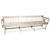 A Long Wood and Iron Painted Bench