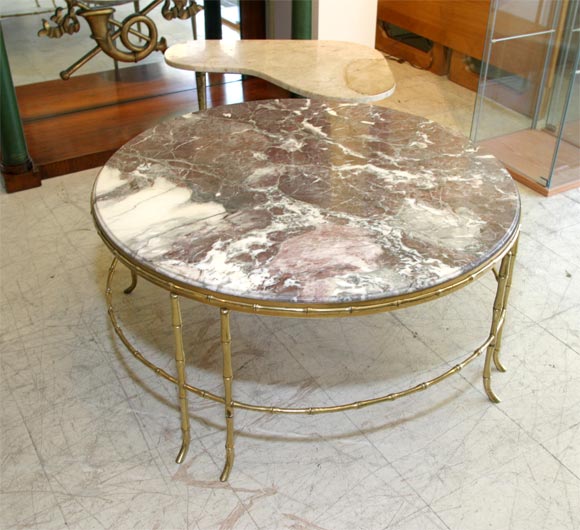 brass base and marble top table