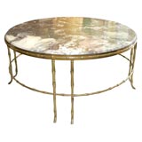 brass base and marble top table