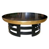 Round black lacqured and gold leaf cocktail table by Kittenger