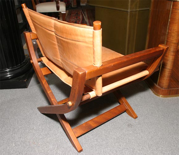 Norwegian Leather and mahogany fold up chair