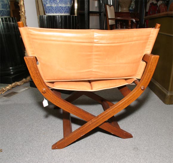 Late 20th Century Leather and mahogany fold up chair