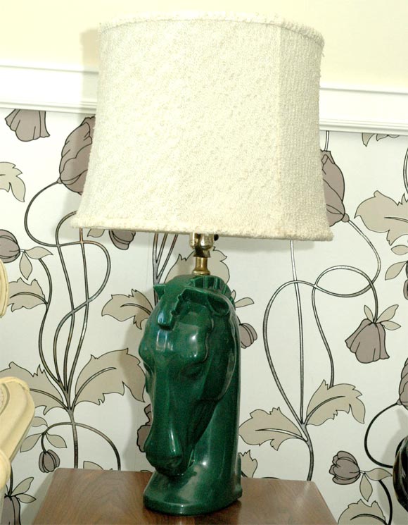 Lovely emerald green horsehead lamp with vintage woven cotton shade.