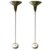 pair of white enamel and brass lamps
