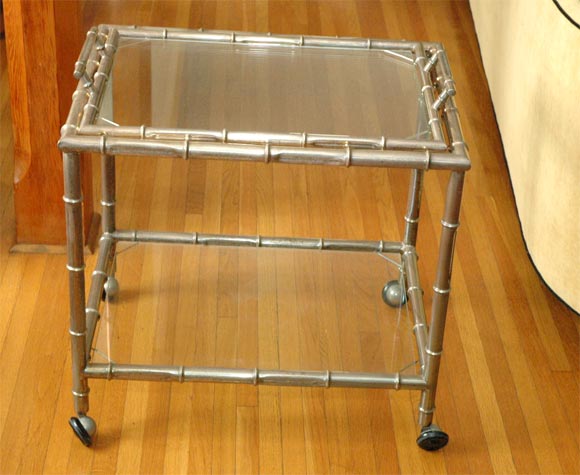 BAMBOO DESIGNED SILVER METAL TWO TIERED TEA CART WITH REMOVABLE TOP AS A TRAY. ON WHEELS