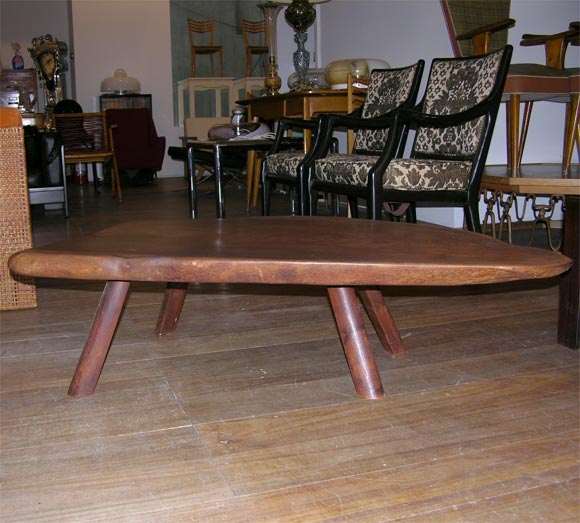 One black walnut coffee table.Attr.to Philip Powell
