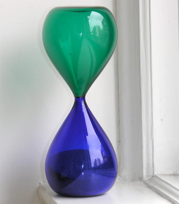 Rare vintage Venini hourglass made of fused glass in beautiful jewel tones of sapphire and emerald.  Paper Venini label from the early '50s makes this even more unusual.  One of the most beautiful clessidres we've seen.