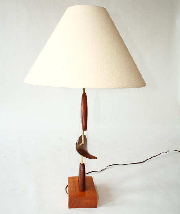 This sculptural “Abstract Fish” lamp of carved wood and monofilament was designed by Clark Vorhees c. 1947 and sold by Kyle-Reed.  Vorhees, an architect turned sculptor, was inspired by the surroundings of his home and studio in the Connecticut