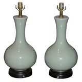 A pair of jade colored ceramic table lamps