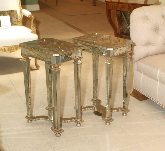 candace barnes designed moderne rendition of late 17th century louis XIV side table. hand wrought in antique mirror fragments, the top with beveled frame with inset medallion, the sides with triangular inserts above hand carved supports on tapered