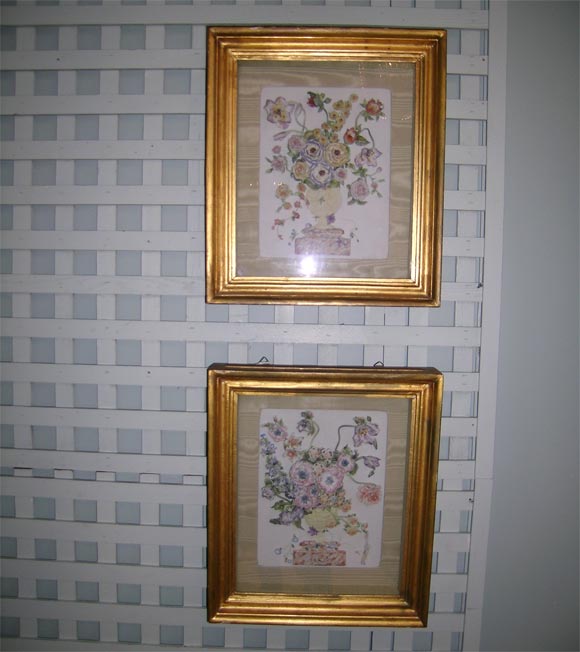 Beautiful and intricate porcelain floral high relief decorations mounted in a shadow box.
A tiny piece of porcelain is tucked in a corner inside the shadow box. Where it came from is not apparent.

  