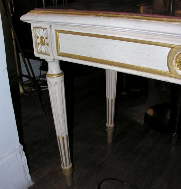 A pair of Louis XVI painted wood consoles