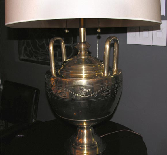 A bronze Art Deco table lamp attributed to Caldwell.
New sockets and rewired
Shade not included
