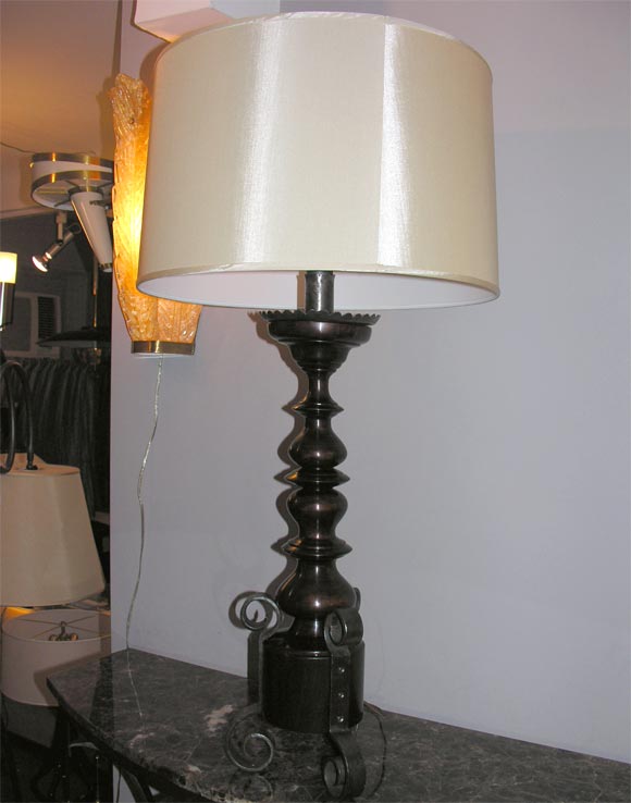 A pair of Art Moderne table lamps wood and wrought iron
New sockets and rewired
Shades not included