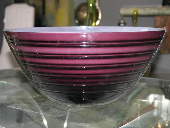 Pair of Murano glass bowls measures 24" diameter
In deep amethyst color layered glass
signed Barbini Murano at the bottom;
one with the original Barbini label.
     