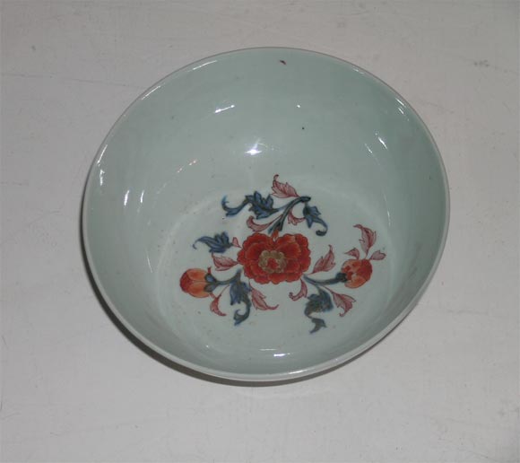 Imari Bowls , one with songbird  in peony boughs, one with lotus and chrysanthemum, one lily and peony, and one with partially unrolled scroll showing still-life, three having interior floral border and and all with central decoration.