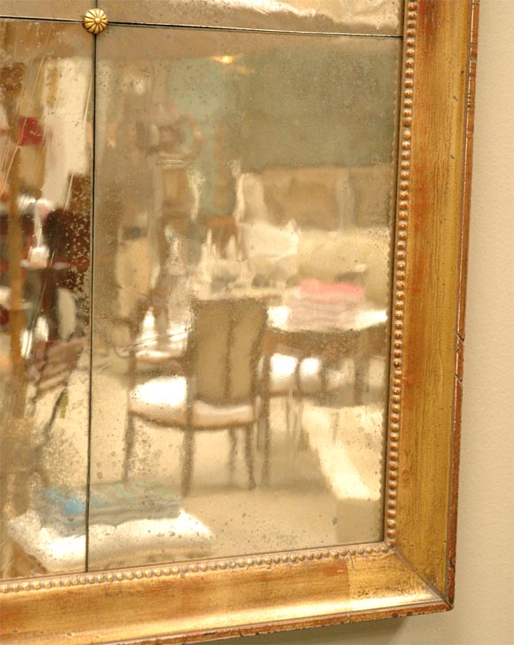 Elegant gold-leaf moulding and glazing that develops a rich patina over time.  Available in custom sizes. 60