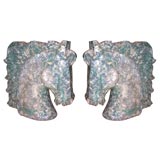 Pair of faux marble horse head table bases