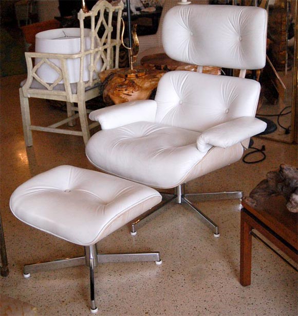 White-on-white Eames-style Lounge and Ottoman
