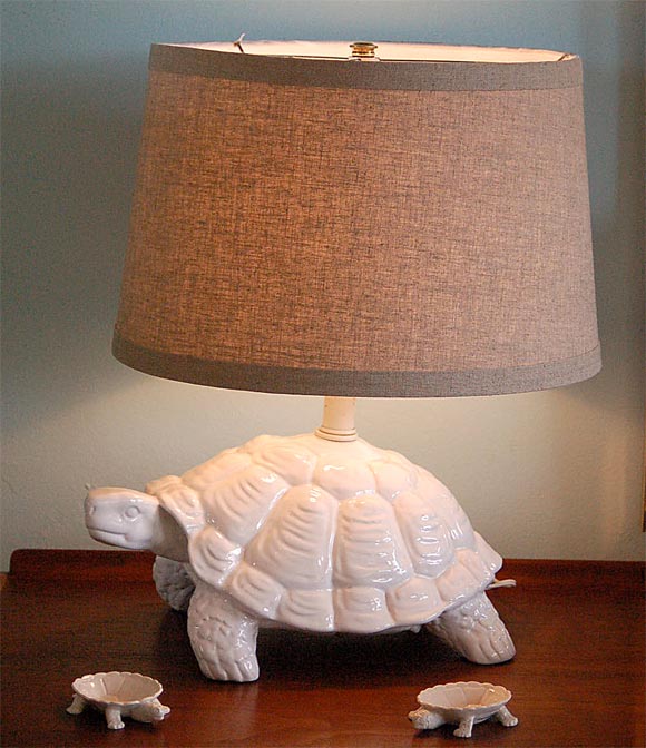 This delightful Italian ceramic turtle lamp slowly manuevered itself down busy Bal Harbour streets to make its new home here at Stripe. Who knew it was turtle season?...Two tiny porcelain turtle dishes with a Bonwit Teller pedigree were soon to join