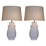 Fine and rare Pair of white terracotta Lamps