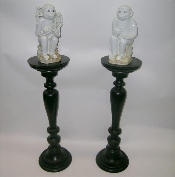 A Pair of Ceramic Blue Eyed Smiling Monkeys