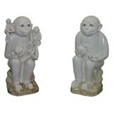 A Pair of Ceramic Blue Eyed Smiling Monkeys