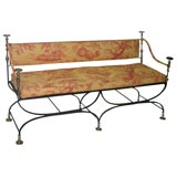 An Iron and Brass Bench